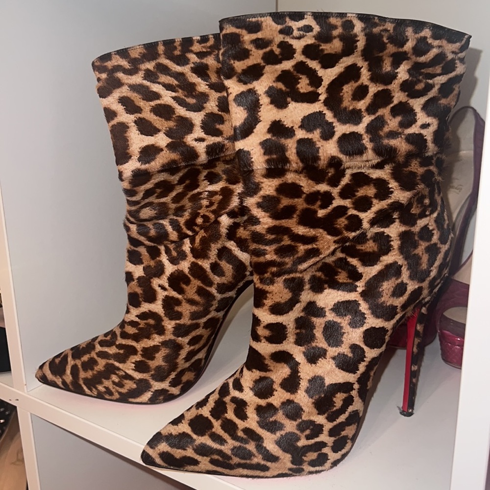 Authentic lightly worn Christian Louboutin true leopard rouge bootie